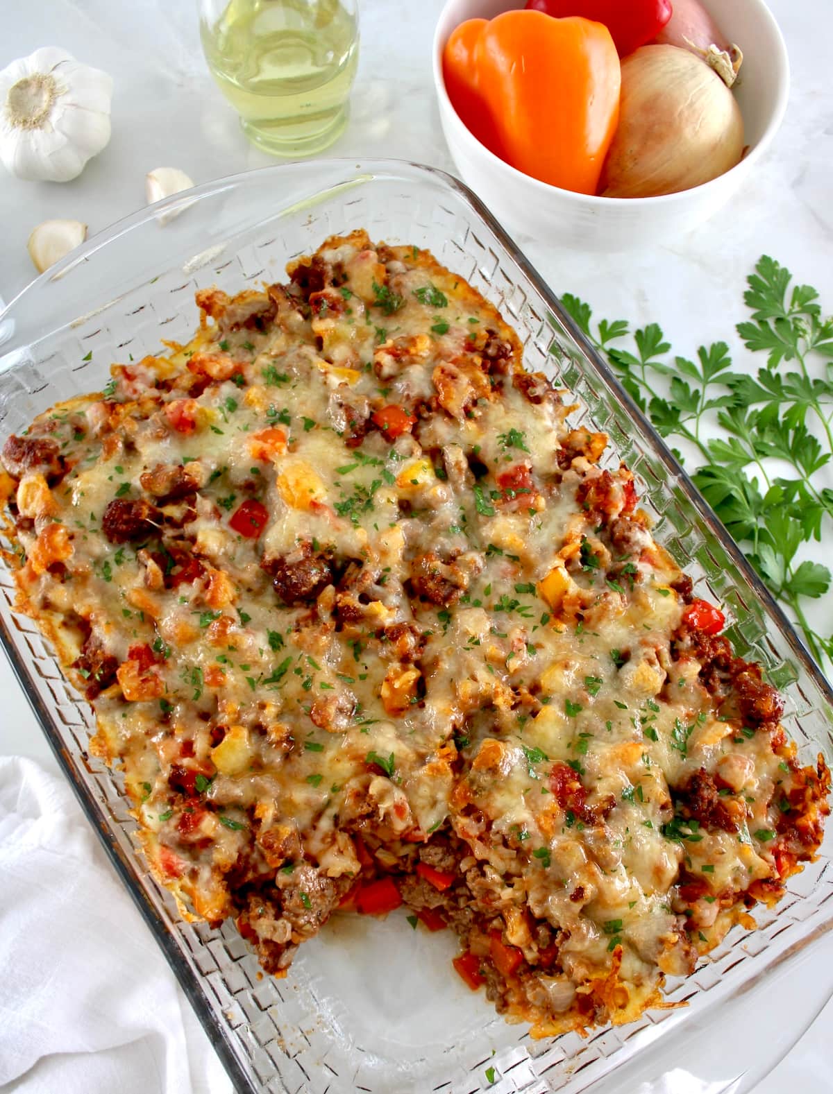 overhead view of Stuffed Pepper Casserole with piece missing