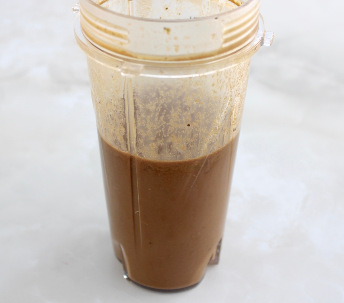 creamy balsamic dressing in bullet blender cup