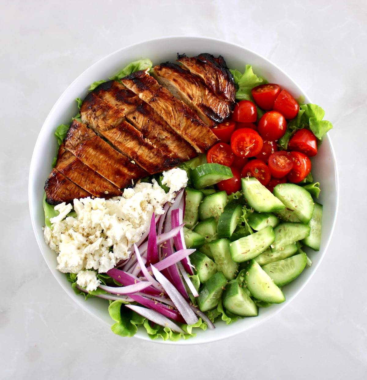 Balsamic Grilled Chicken Salad in white bowl without dressing