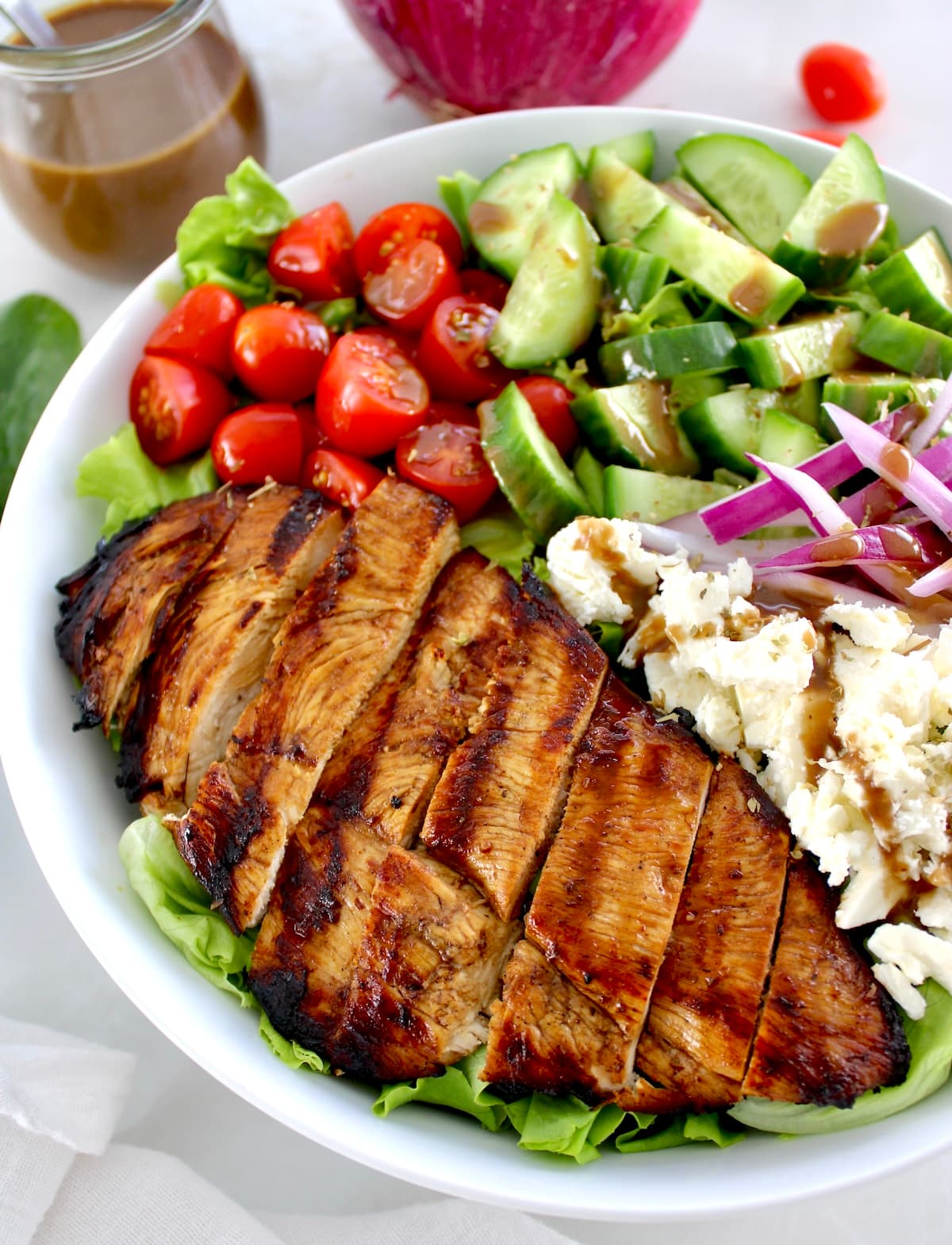 closeup pf Balsamic Grilled Chicken Salad in white bowl
