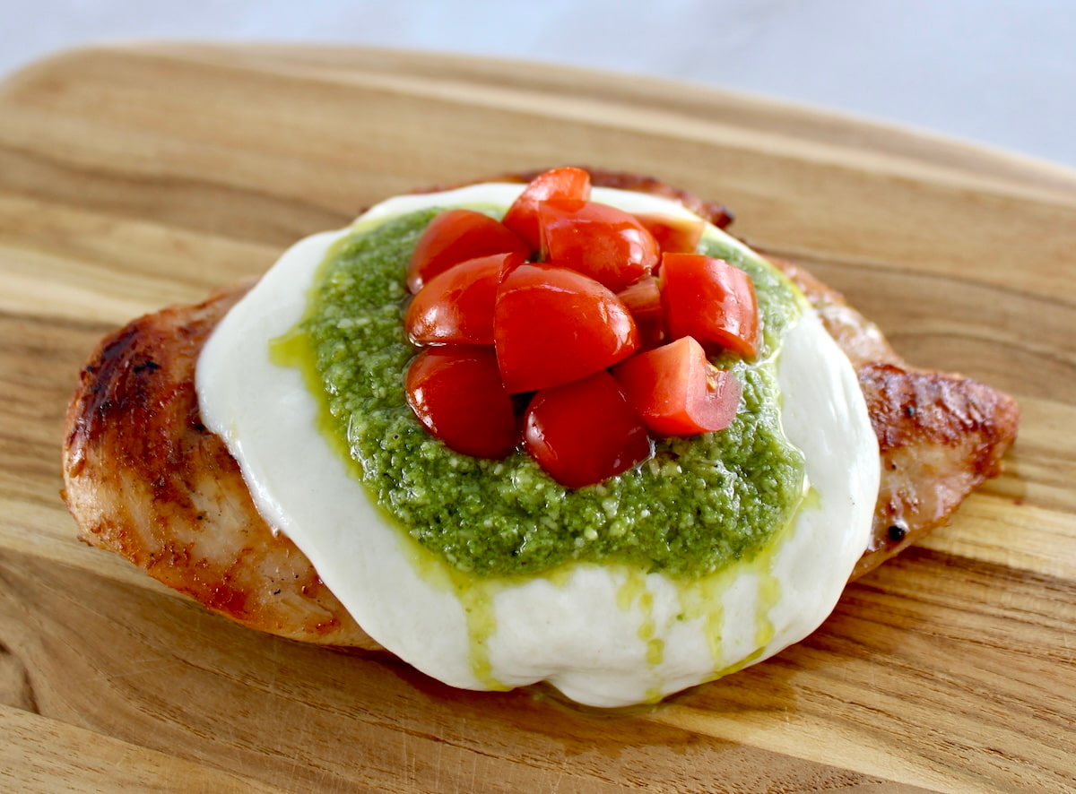Grilled Chicken Margherita on cutting board