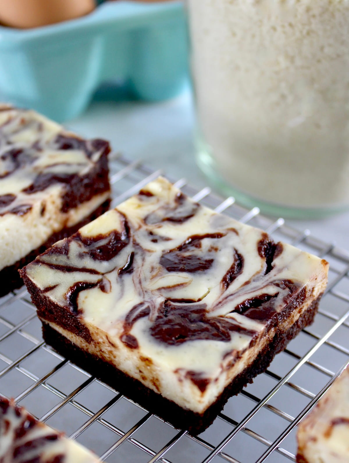 Keto Cheesecake Brownie Bars on cooling rack