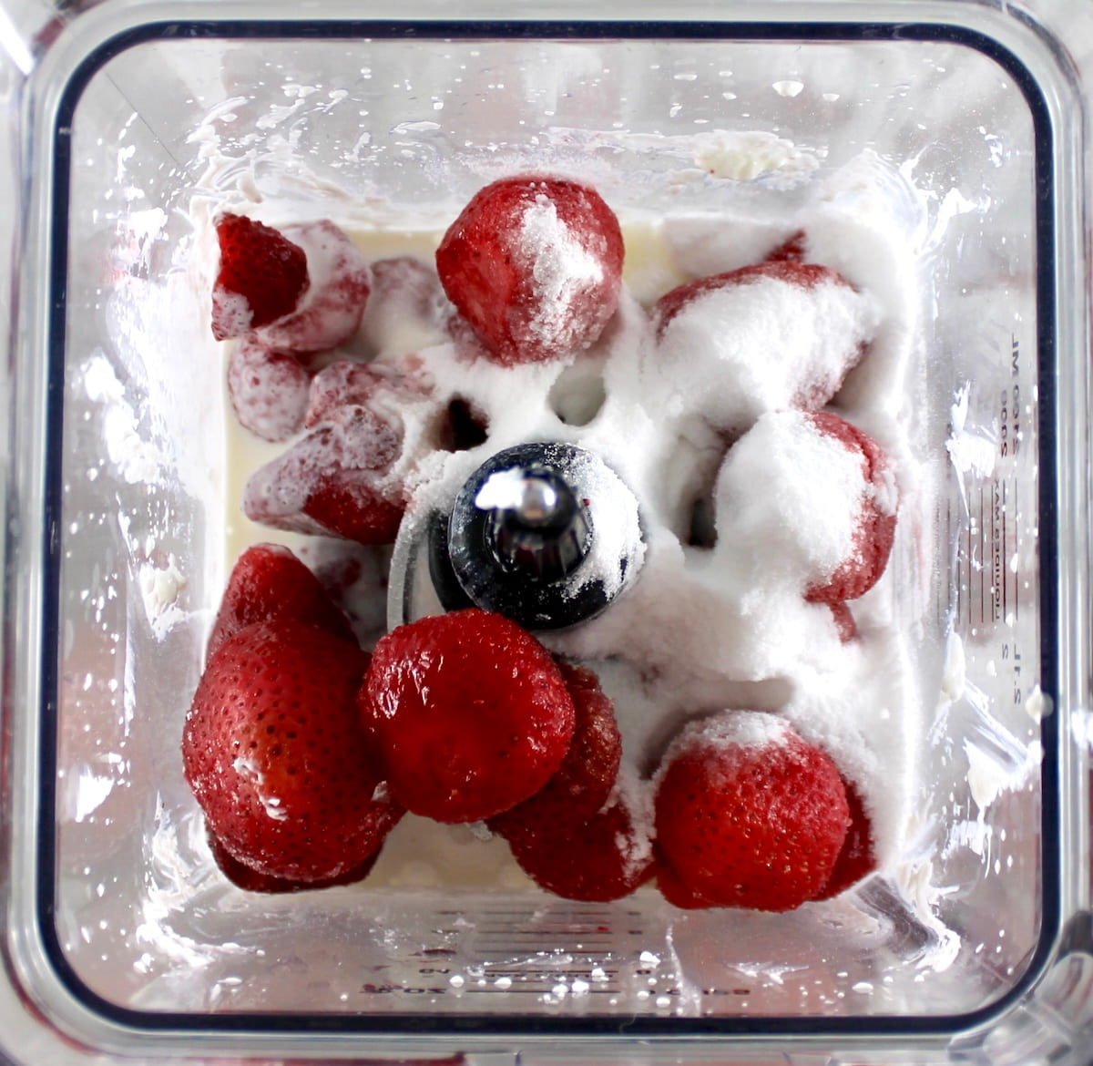 strawberries, sweetener and cottage cheese in blender unmixed