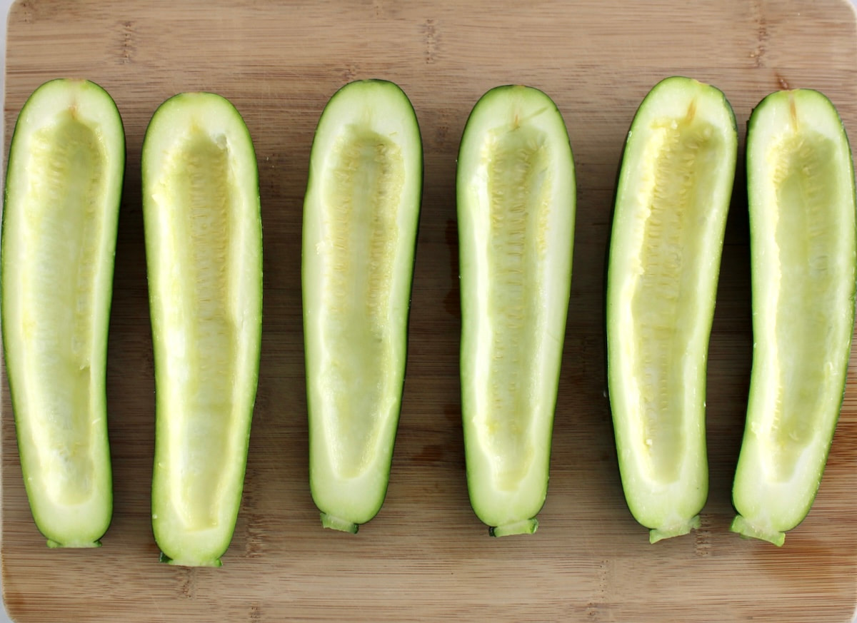 2 halves of zucchini with middles scooped out