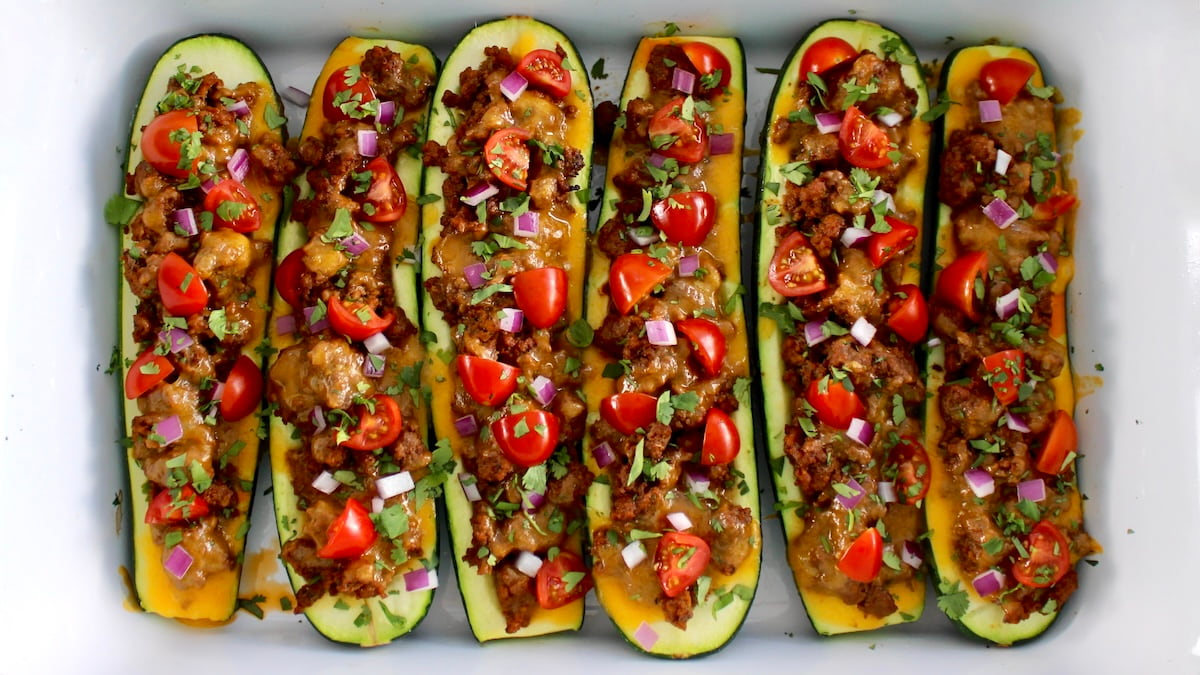 overhead closeup of 5  Taco Zucchini Boats in white casserole