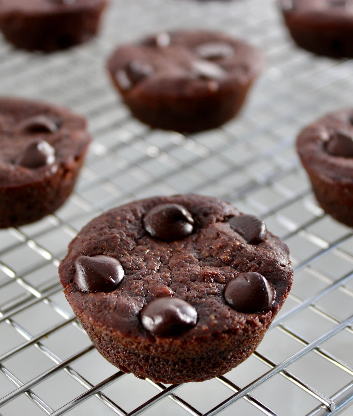 closeup of Chocolate Coconut Brownie Bites on wire rack