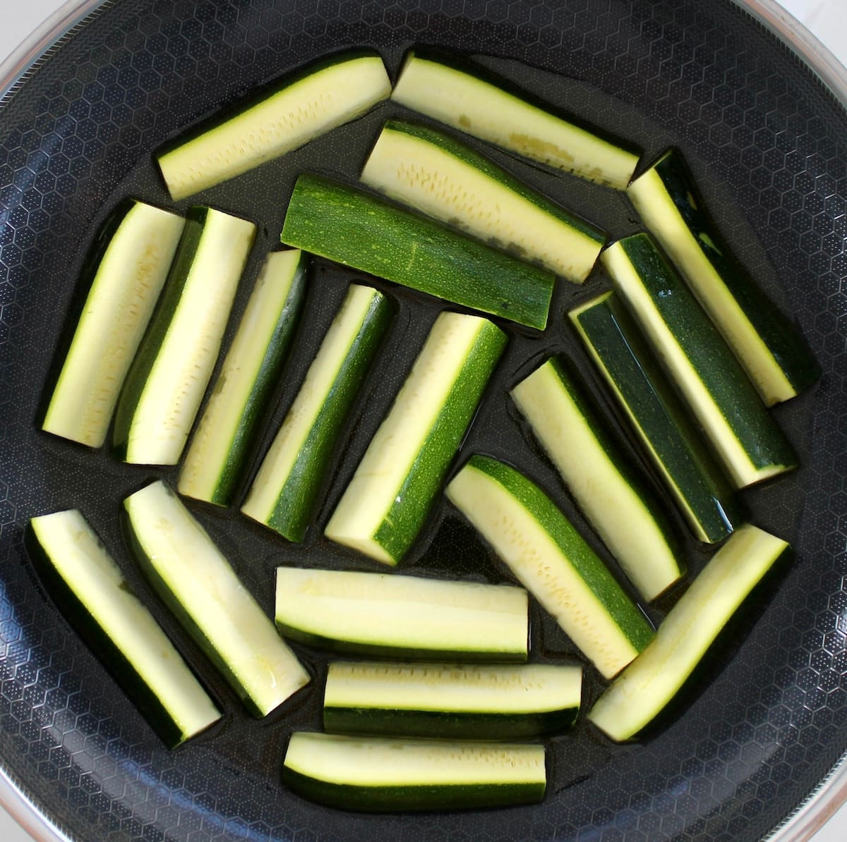 zucchini sticks in skillet
