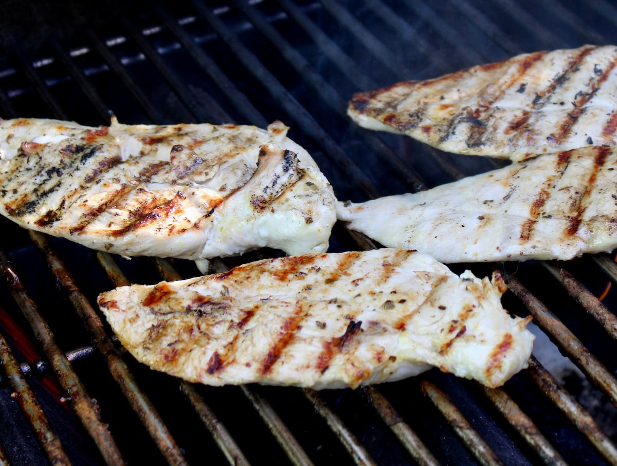 chicken breasts being grilled
