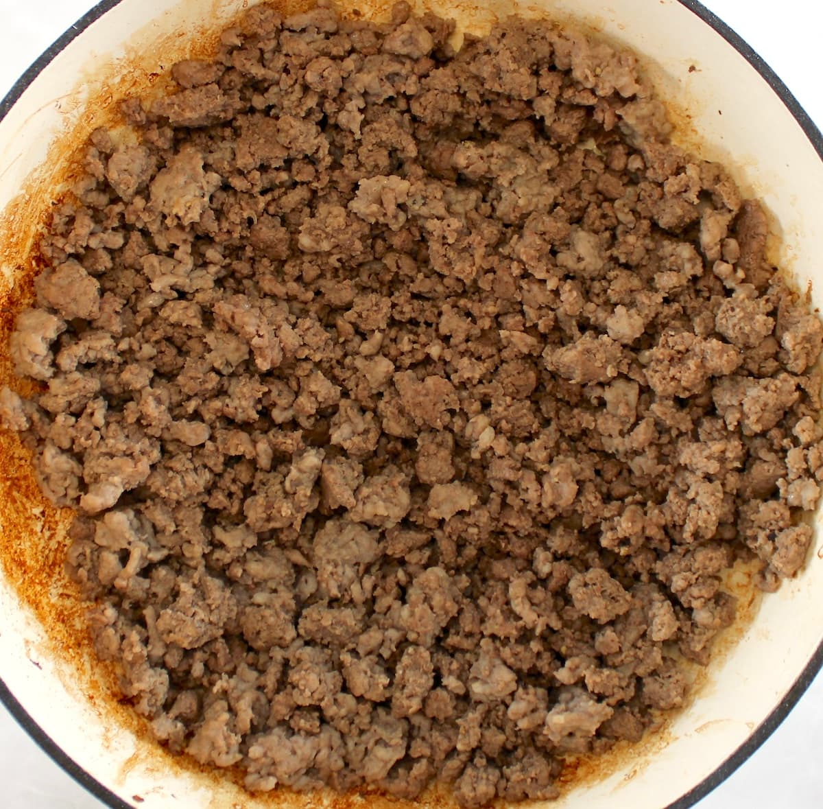 browned ground beef and italian sausage in pot