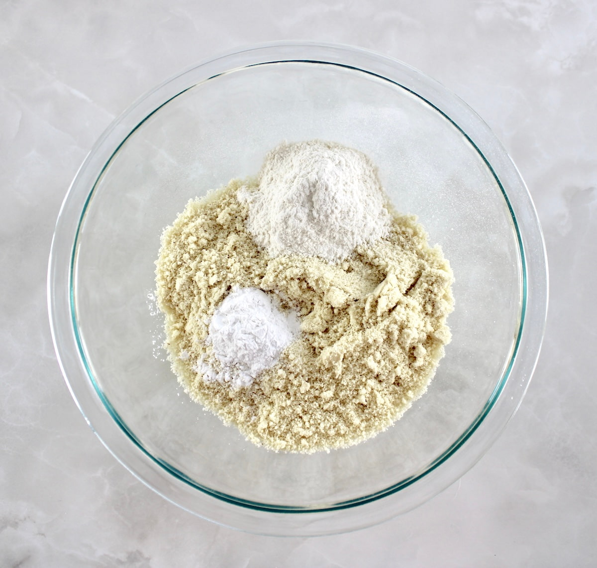 Keto Blueberry Crumb Loaf dry ingredients in glass bowl unmixed