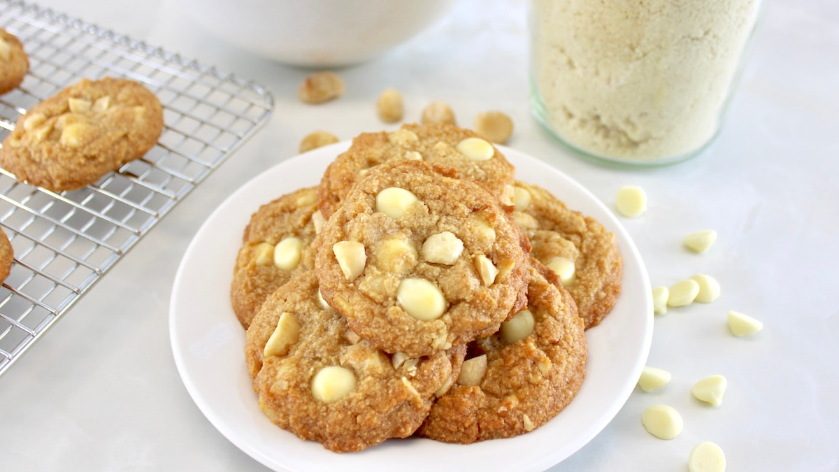Keto White Chocolate Macadamia Nut Cookies on white plate