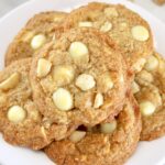 closeup of Keto White Chocolate Macadamia Nut Cookies on white plate