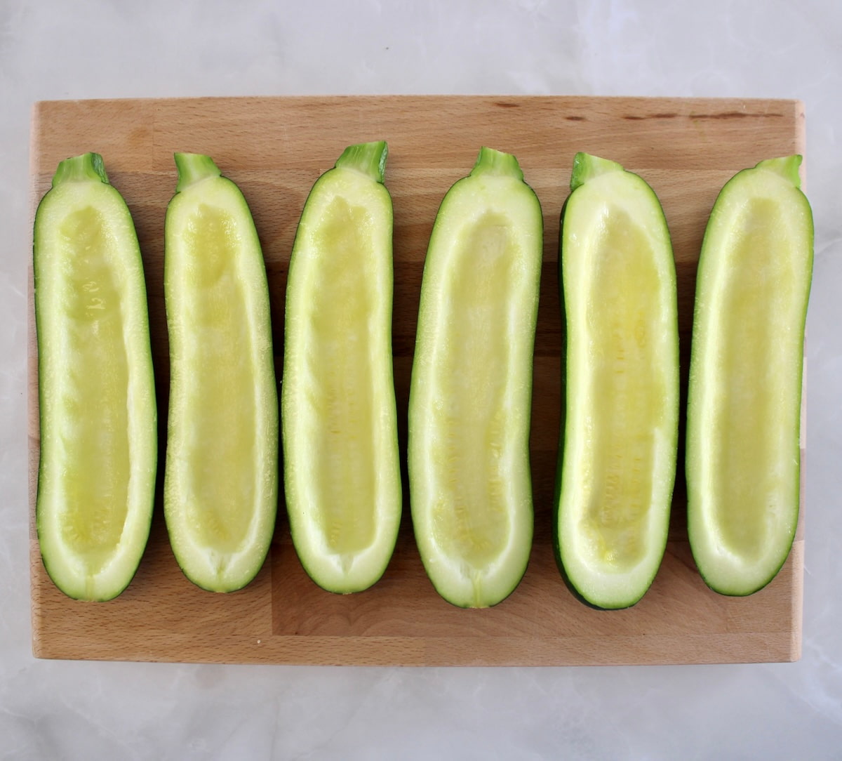 6 zucchini halves with insides scraped out