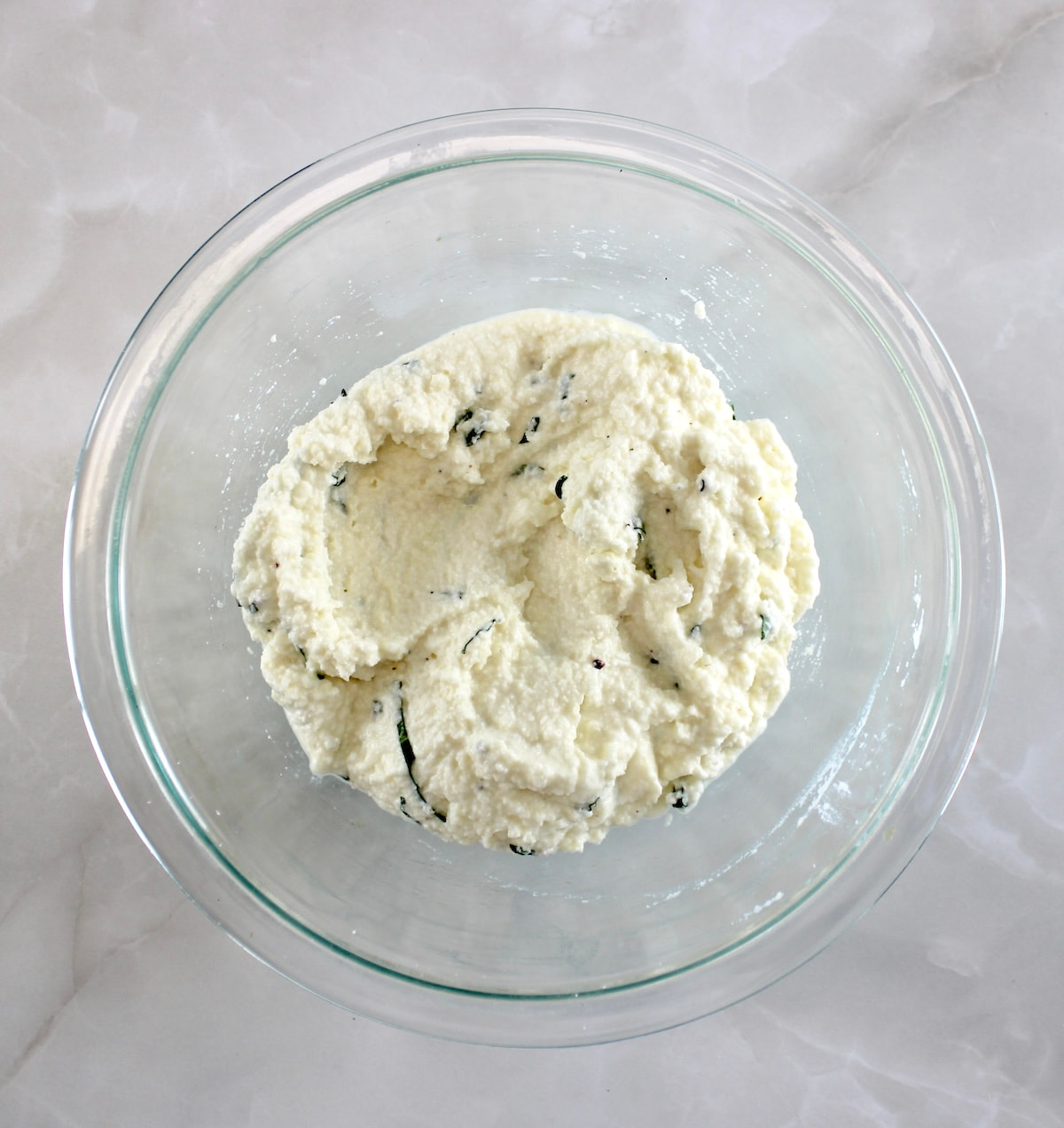cheese stuffing for Lasagna Stuffed Zucchini Boats in glass bowl