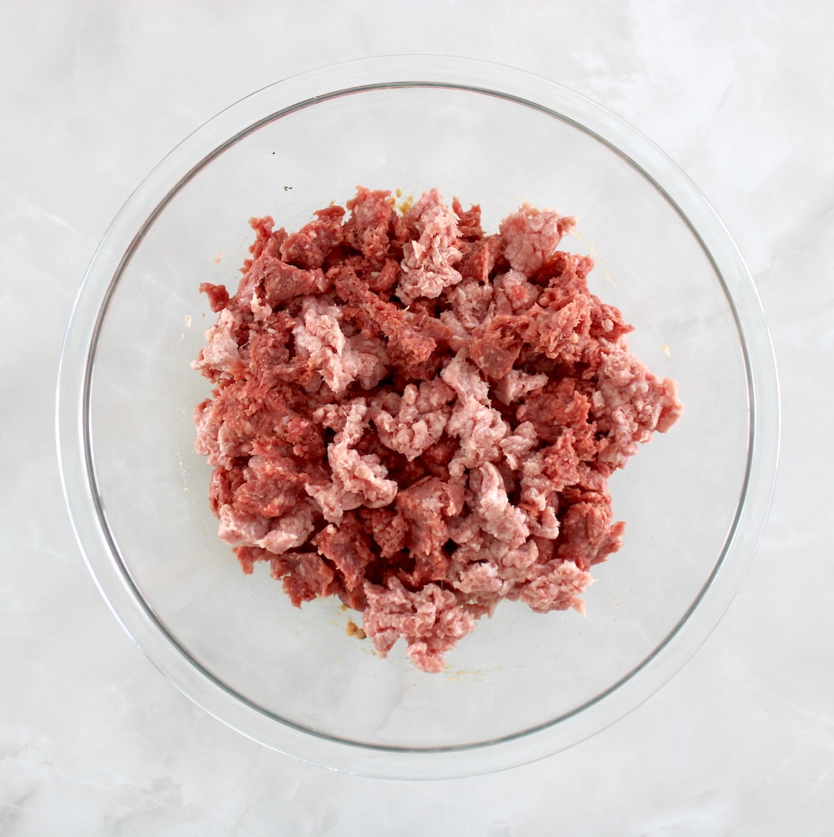 ground pork and beef in glass bowl