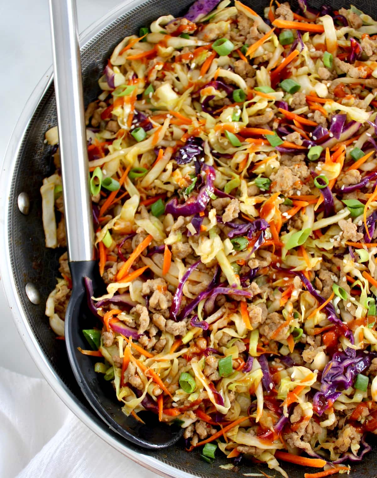 Keto Egg Roll in a Bowl with black serving spoon on side