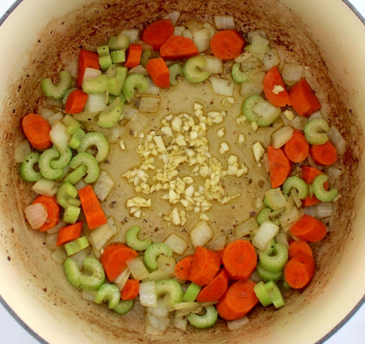 chopped carrots, celery, onions and garlic in pot