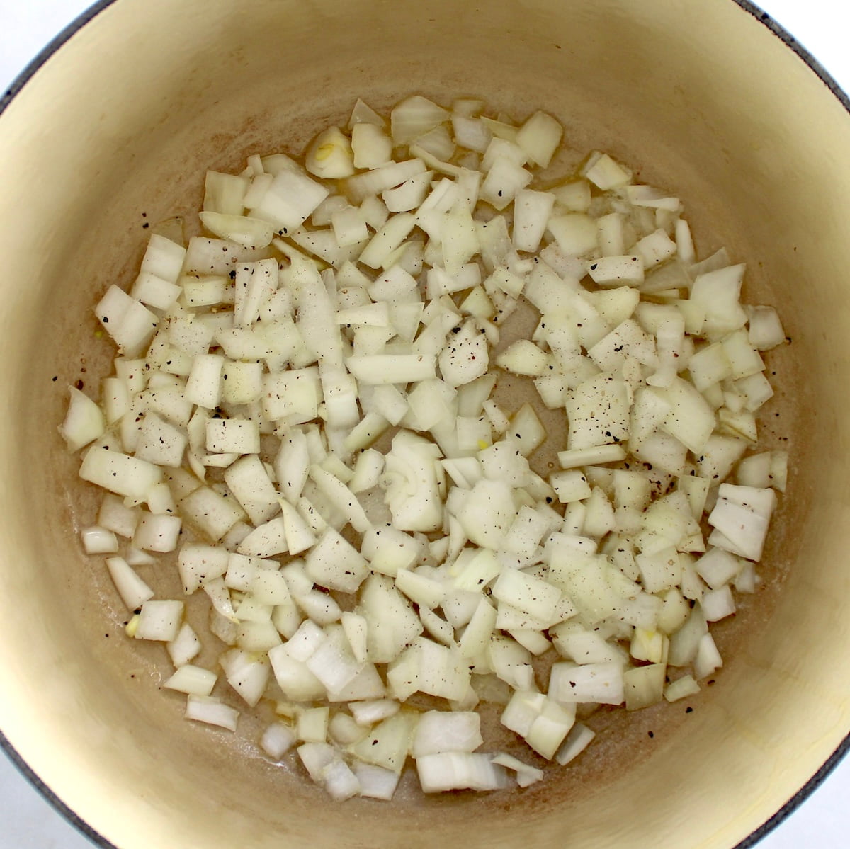 diced onions in pot