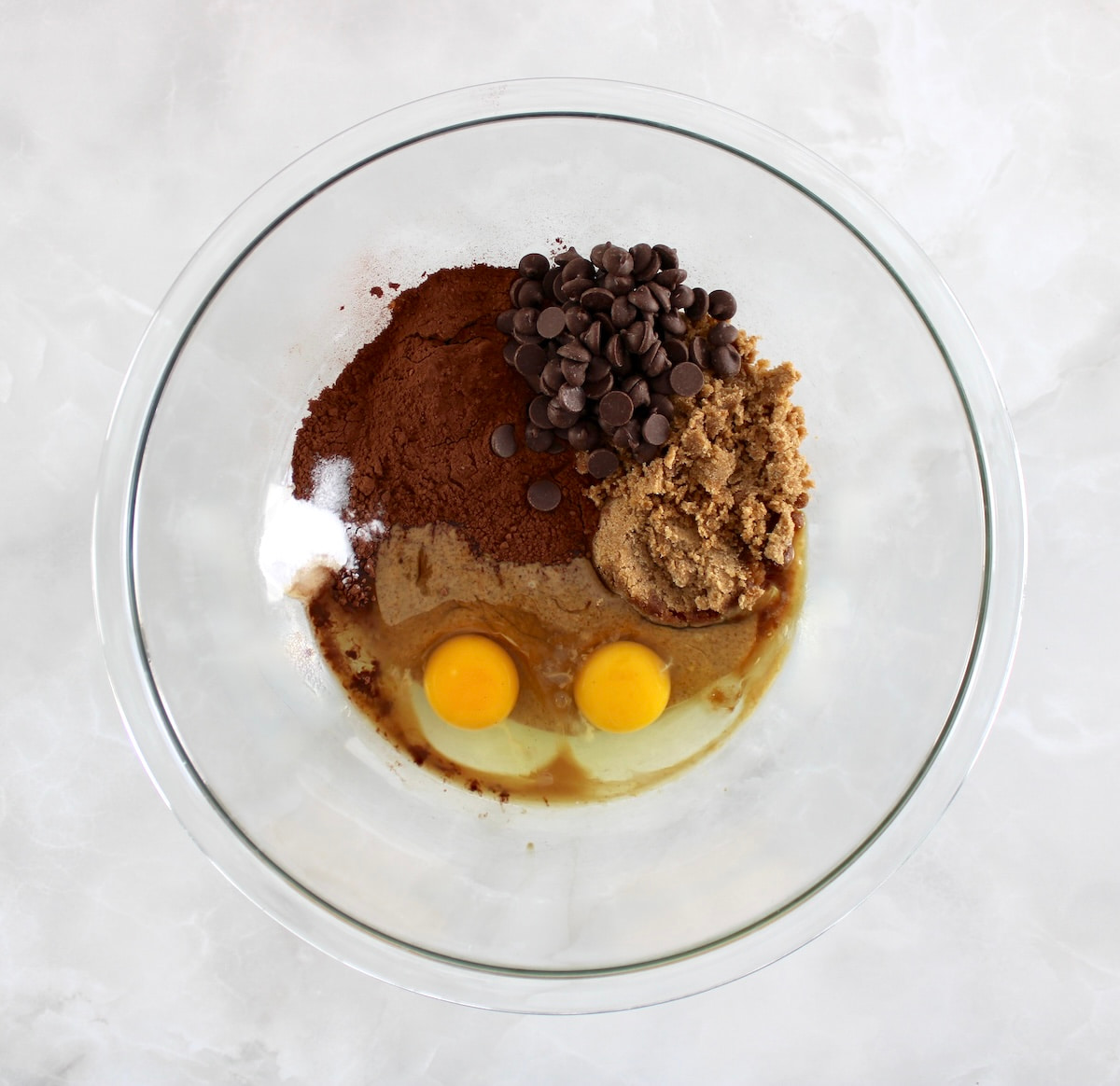 Keto Chocolate Almond Butter Cookies batter ingredients in glass bowl unmixed