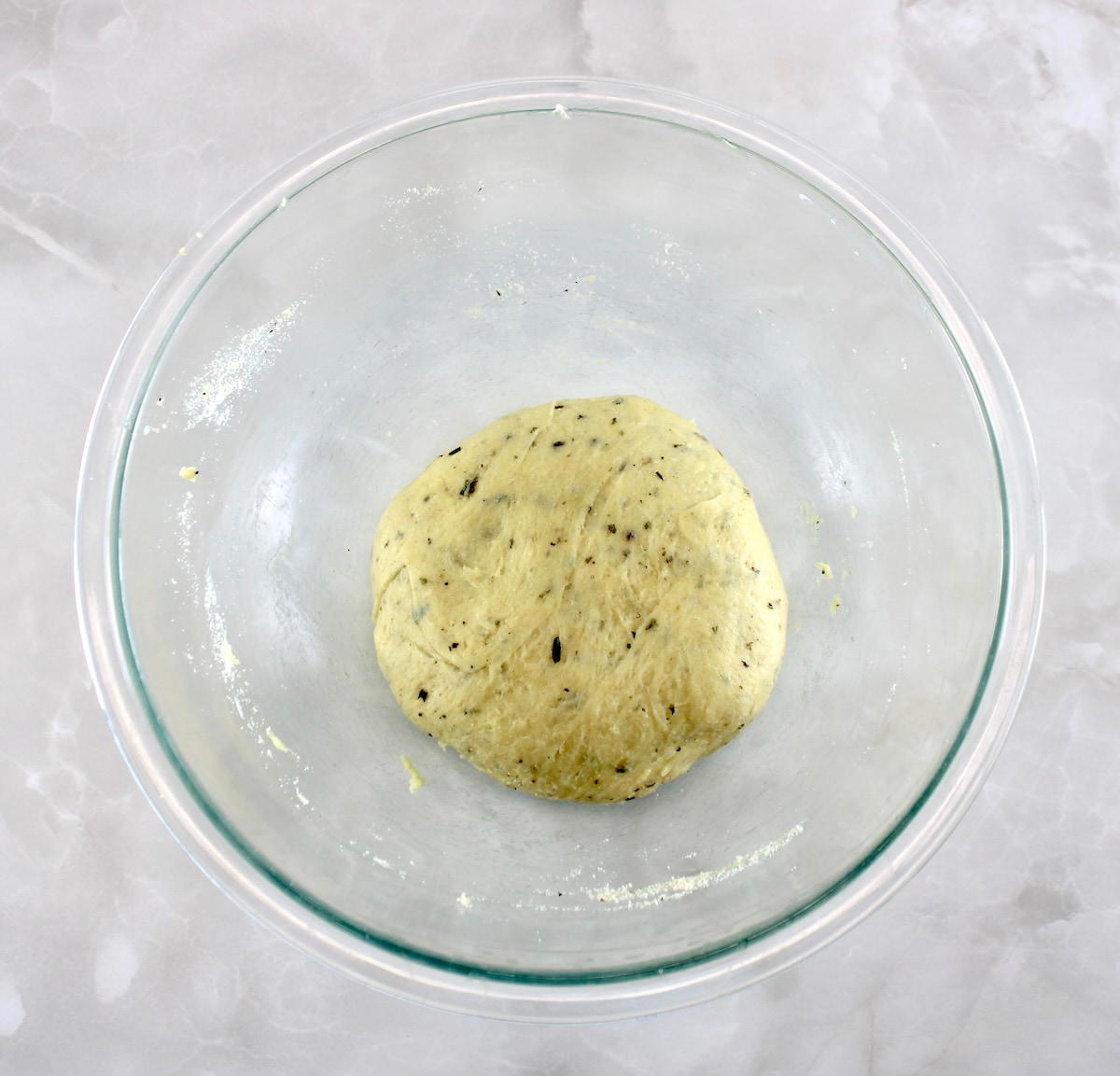Keto Focaccia Breadsticks dough ball in glass bowl
