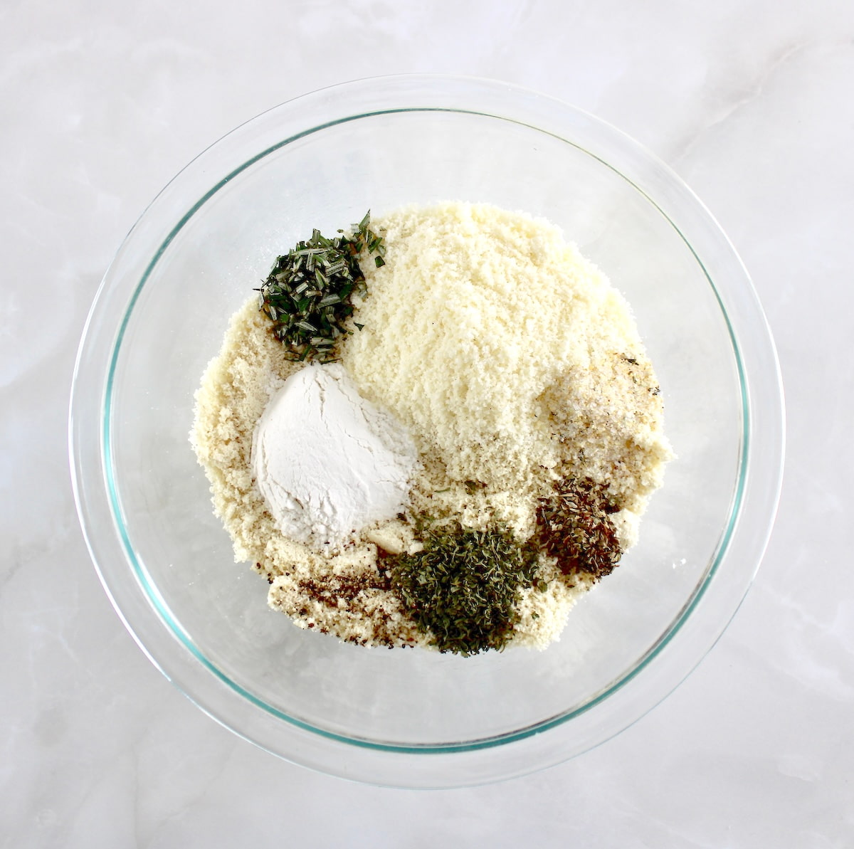 dry ingredients for Keto Focaccia Breadsticks in glass bowl unmixed