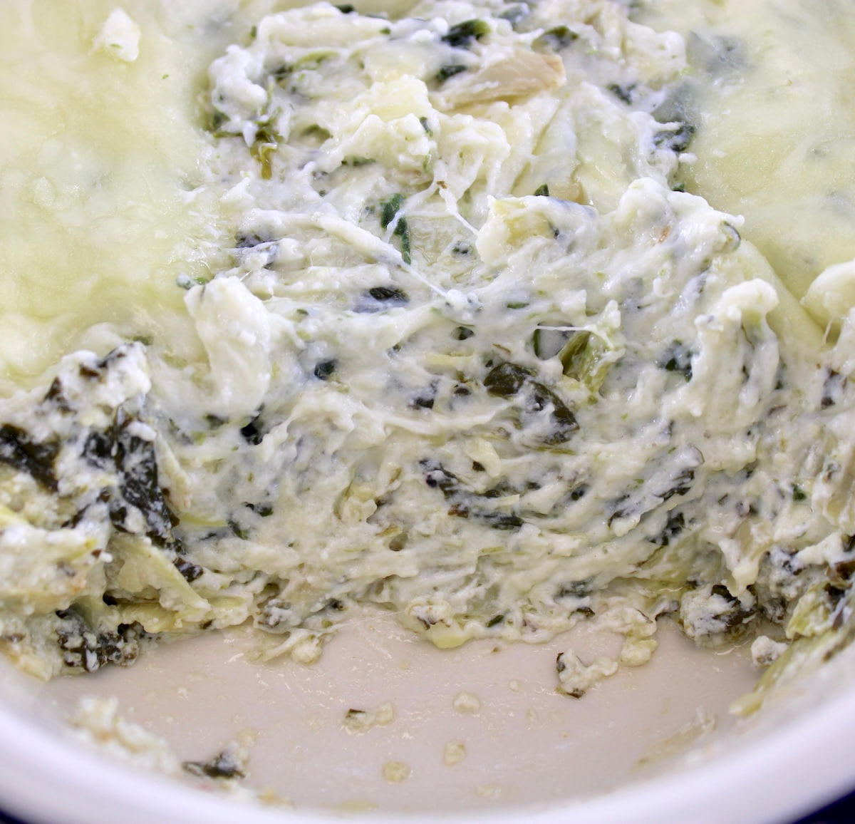 closeup of Spinach Artichoke Dip in casserole
