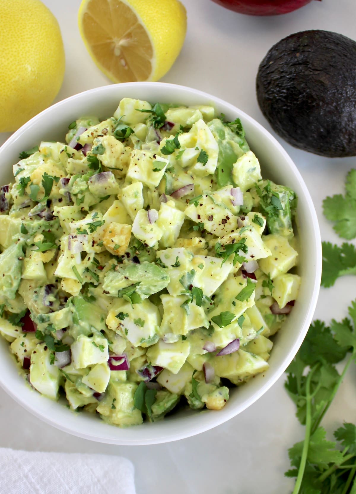 overhead view of Avocado Egg Salad in white bowl