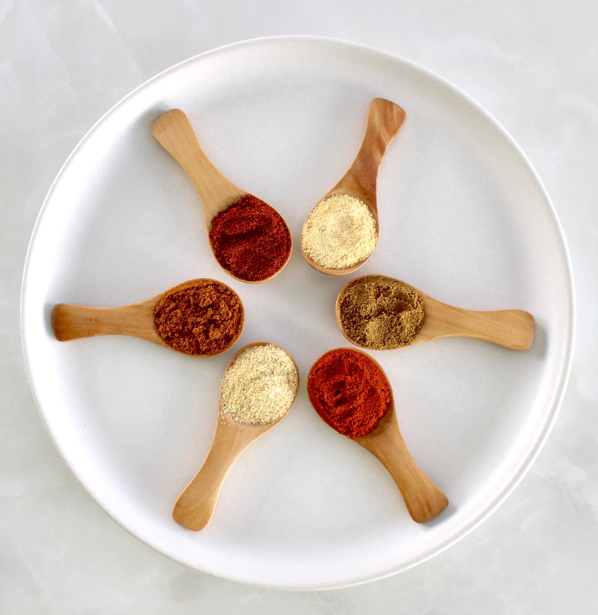 6 wooden spoons with Homemade Chili Seasoning in each