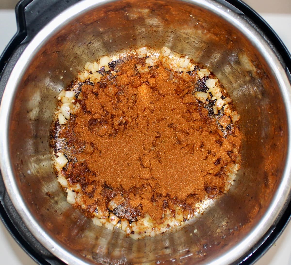 chili seasoning toasting in instant pot