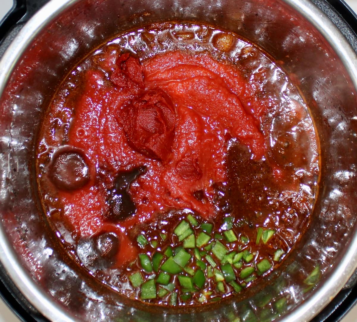 Keto Instant Pot No-Bean Chili ingredients in instant pot unmixed
