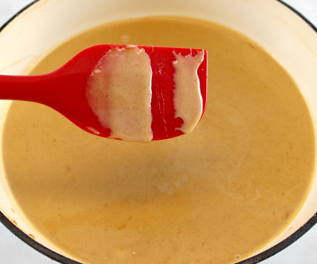 Keto Pumpkin Spice Coffee Creamer in skillet with red spatula