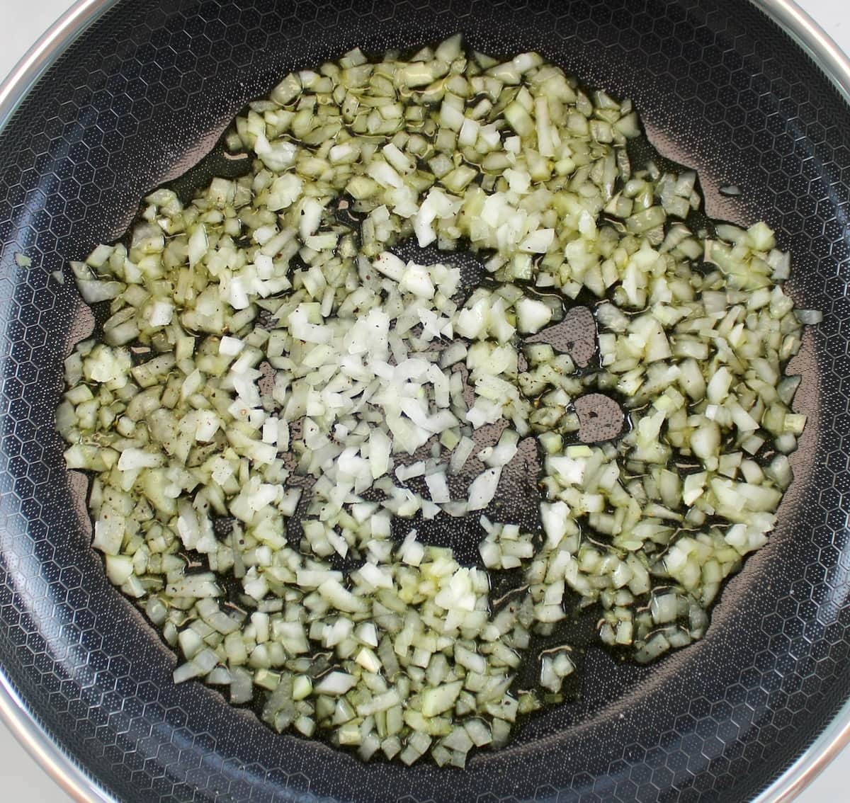 minced onions in skillet