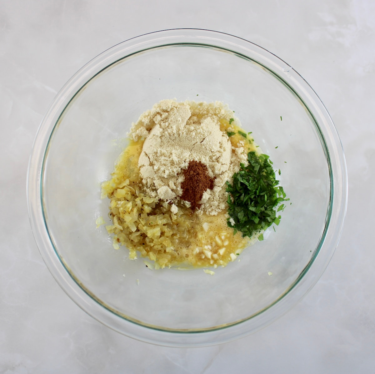 Keto Swedish Meatball ingredients in glass bowl unmixed