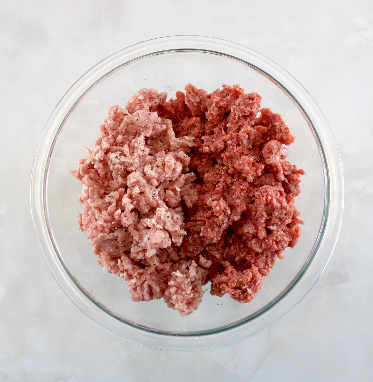 Keto Swedish Meatball ingredients in glass bowl unmixed