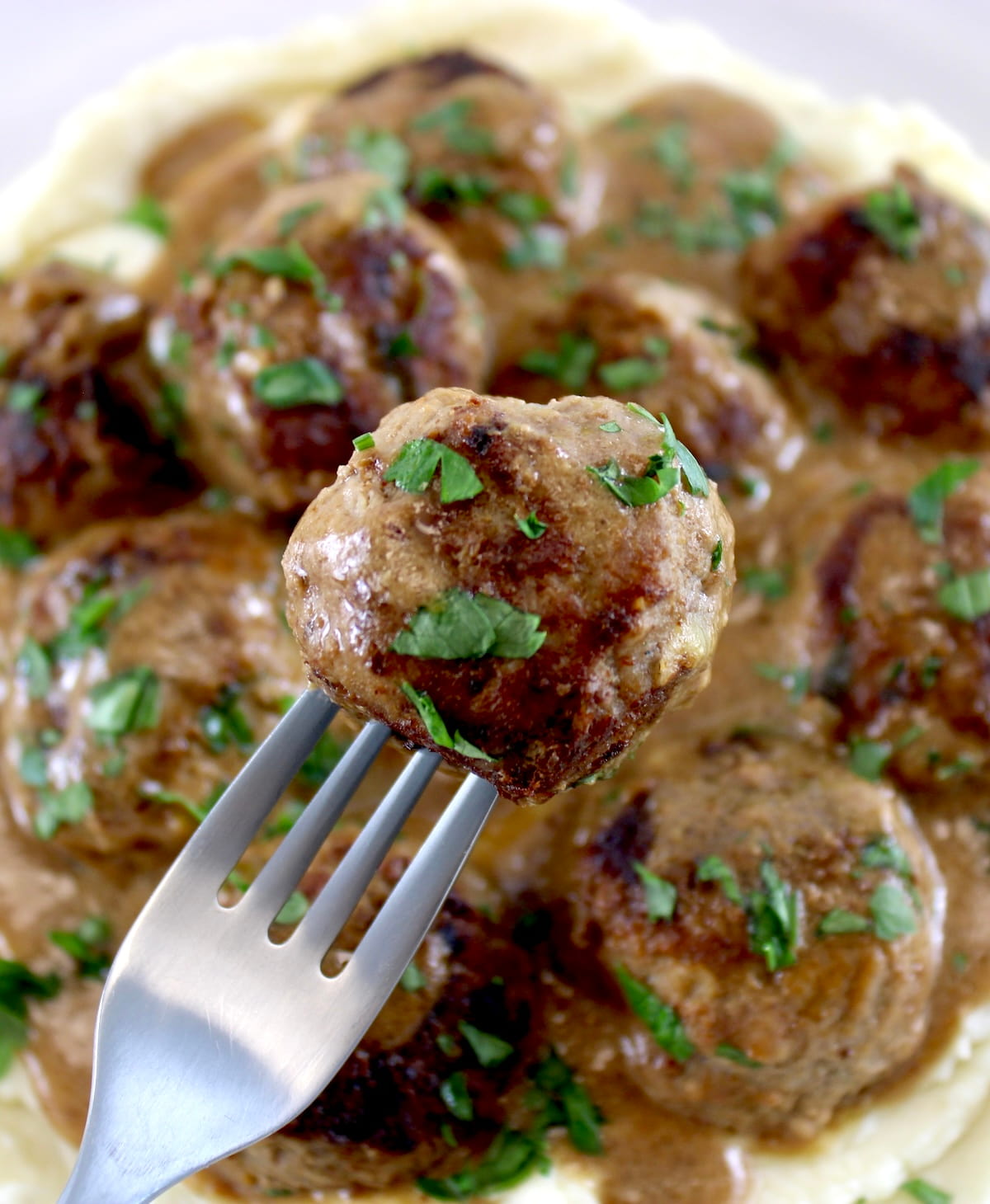 holding up Keto Swedish Meatball on fork